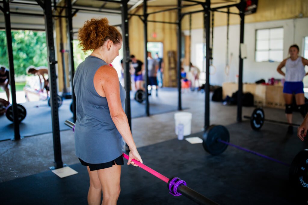 Member with a barbell at Arc Reactor CrossFit Gym in Zanesville