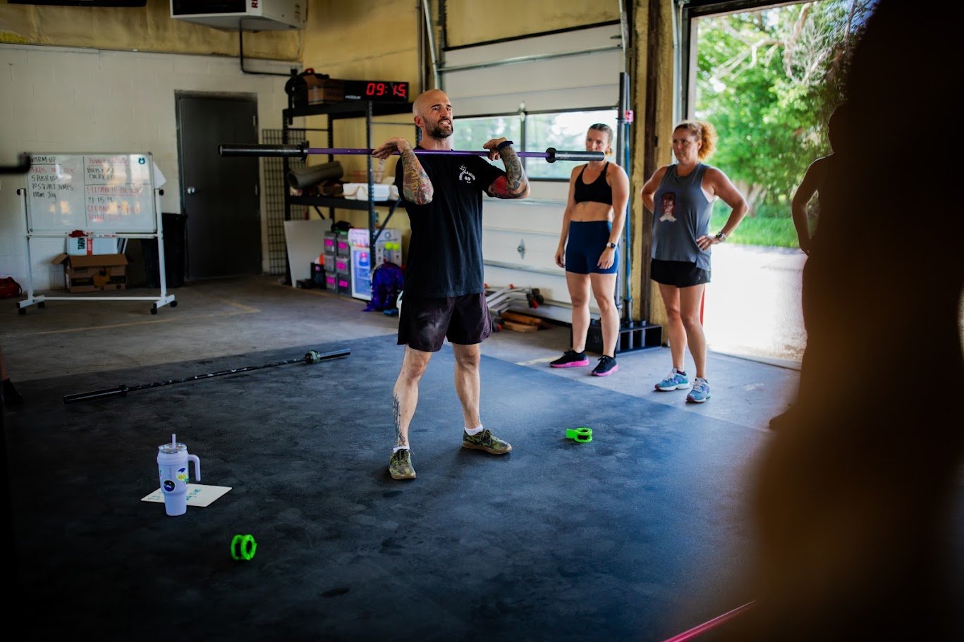 Coach leading barbell technique class at Arc Reactor CrossFit in Zanesville