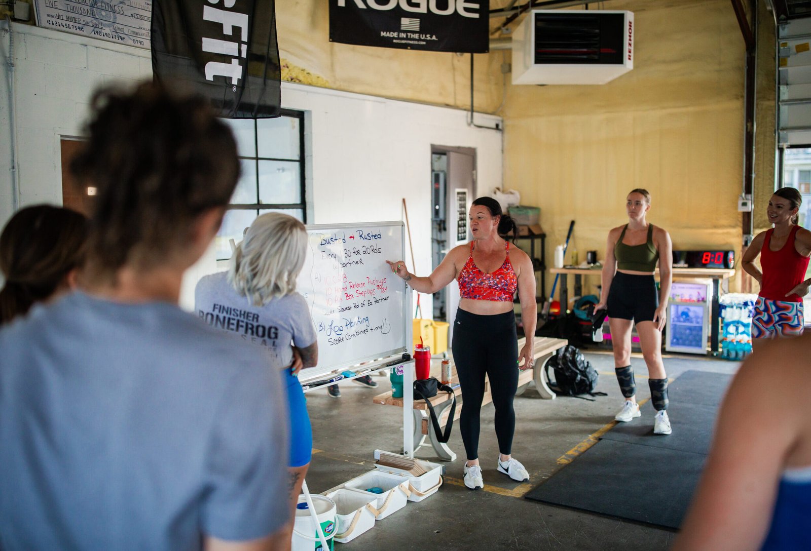 Arc Reactor CrossFit community in Zanesville supporting each other during a group workout